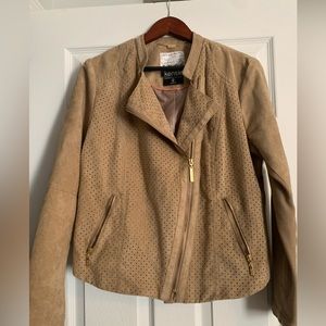 Kenzie Faux Suede Tan Jacket. Gold accent diagonal zipper. Diamond eyelets.
